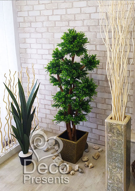 Artificial bonsai tree, buy on tables in a cafe