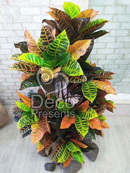 Artificial croton in a decorative flowerpot, buy in Norway, Denmark, Austria, Switzerland