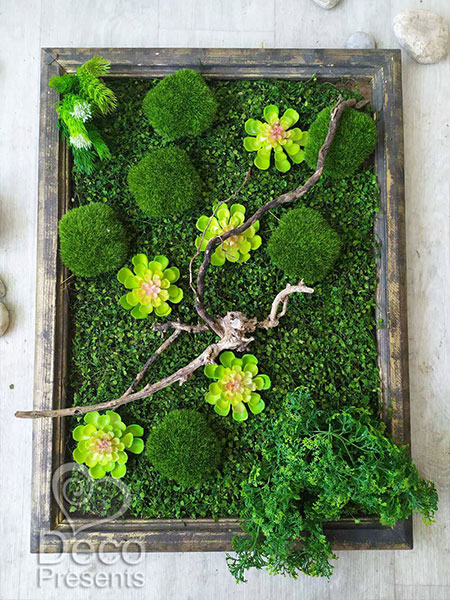 Decorative moss and artificial succulent plants wall art panel for restaurant interior